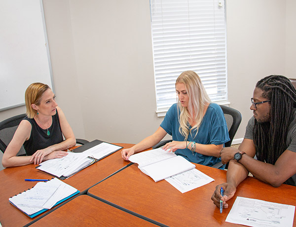 screenwriting course - Jill w two students